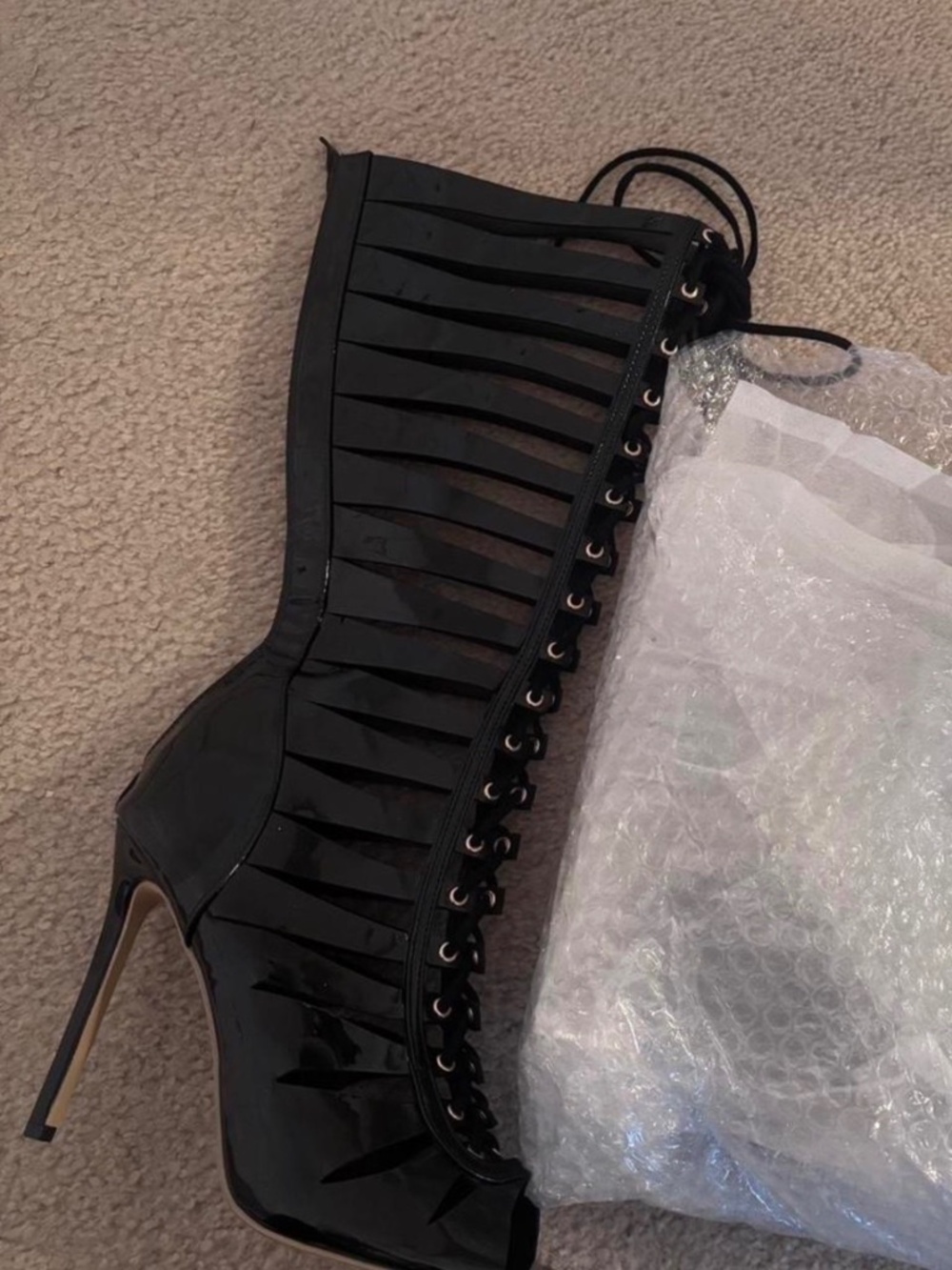 Black hollow out cross strap knee high heel boots